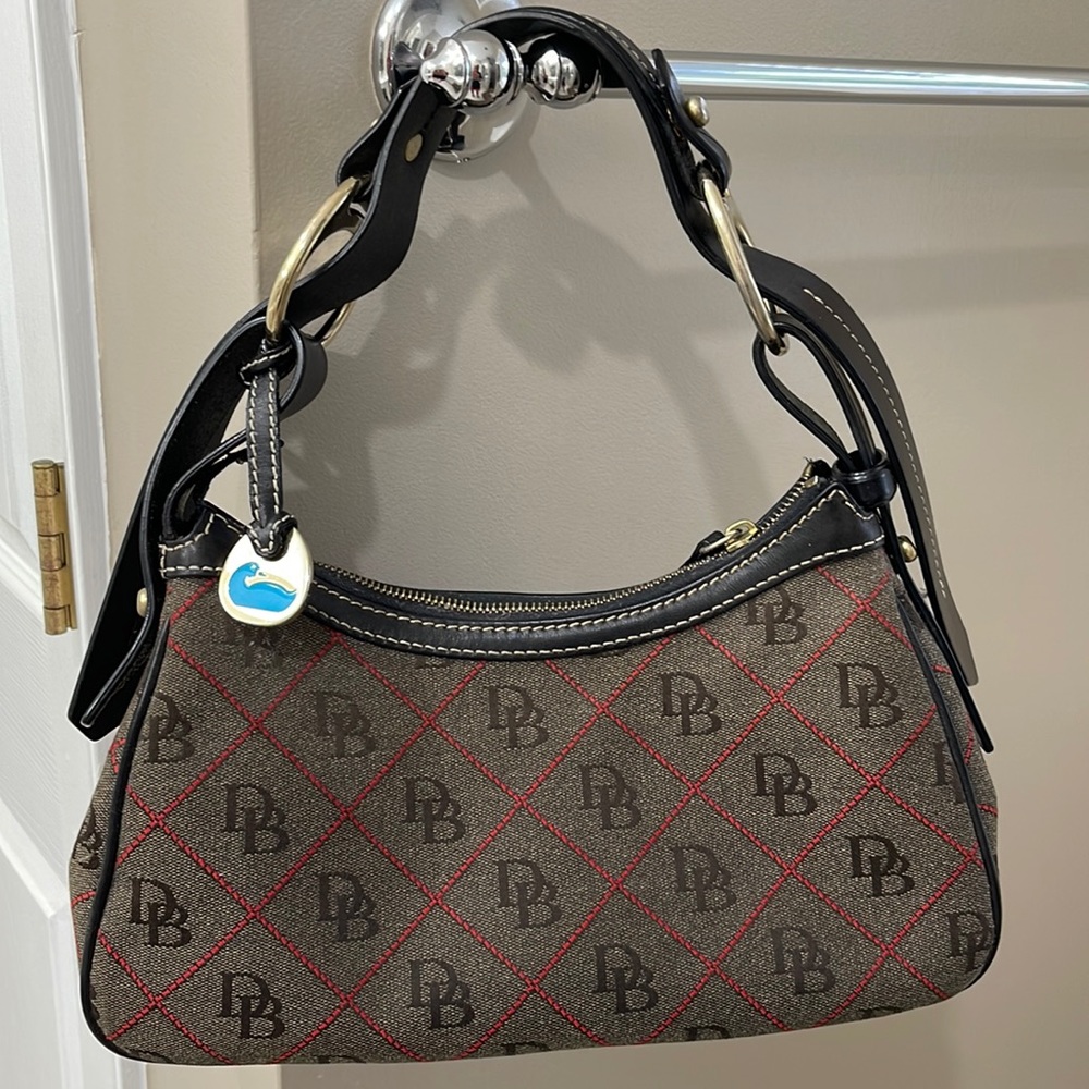 Dooney&Bourke handbag. Leather strap, sturdy canvas material inside and outside